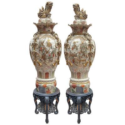 Spectacular pair of Japanese Satsuma lidded vases, circa 1890, on stands. 200cm