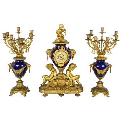 French 19th Century ormolu and porcelain clock set.