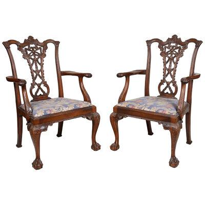 Pair 19th Century Chippendale style ribbon back arm chairs,
