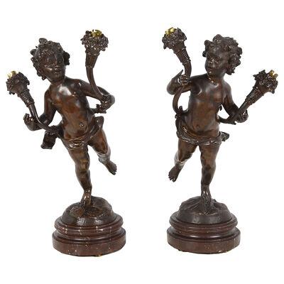 Pair 19th Century Bronze Cherub lamps.