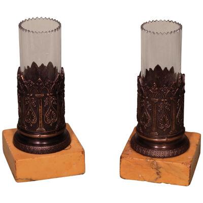 A pair of Regency period bronze spill vases