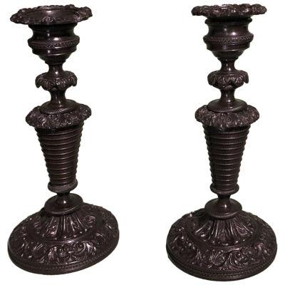 A pair of early 19th Century French bronze Candlesticks.