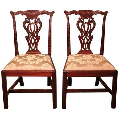A set of six Chippendale period carved mahogany single chairs