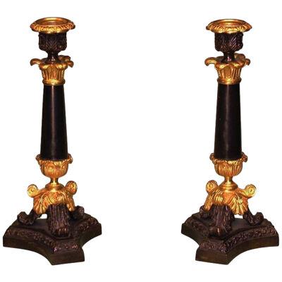 Pair of mid 19th Century well-cast bronze, ormolu and marble Candelsticks.