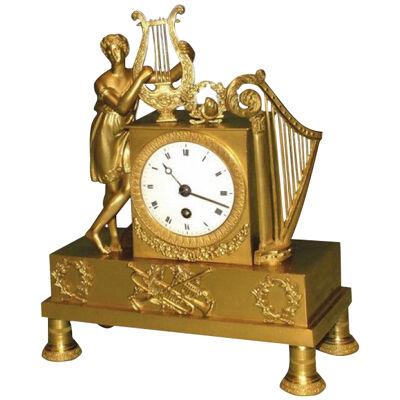 An attractive small early 19th Century French Mantel Clock.
