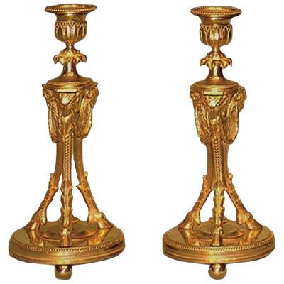 A well cast pair of mid 19th Century ormolu Candlesticks.
