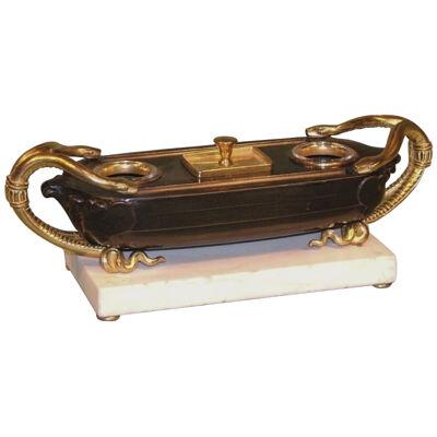 An antique French bronze and ormolu boat-shaped Pentray.