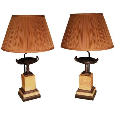A pair of Regency period bronze and Sienna marble tazzas mounted as lamps
