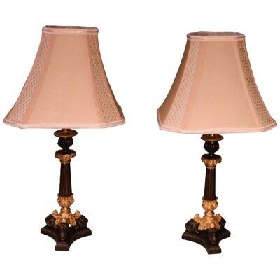 Pair of Bronze and Ormolu Triform Candlestick Lamps	