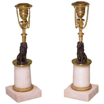Pair of 19th Century bronze ormolu and marble Lion Candlesticks.	