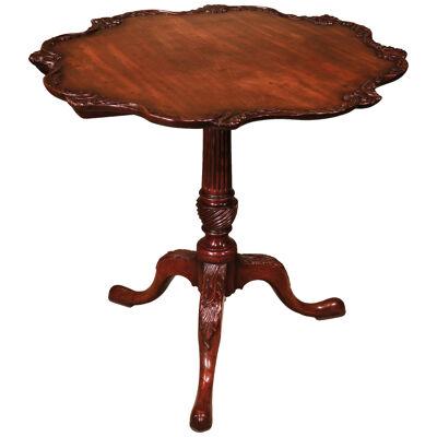 A George III period carved mahogany tripod table