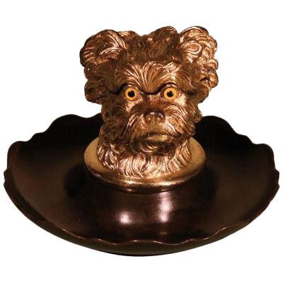 A mid 19th century bronze and ormolu inkwell in the form of a shaggy dog