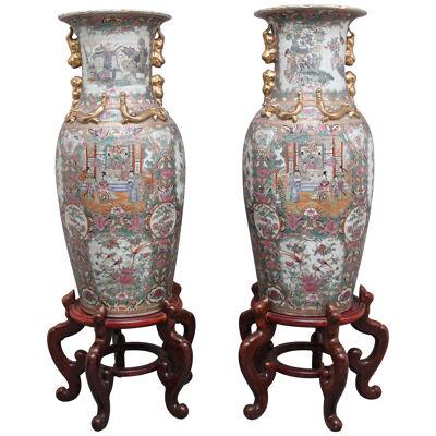 A large pair of highly decorative mid 20th Century Chinese vases