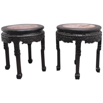 A pair of 19th Century Chinese carved hardwood occasional tables