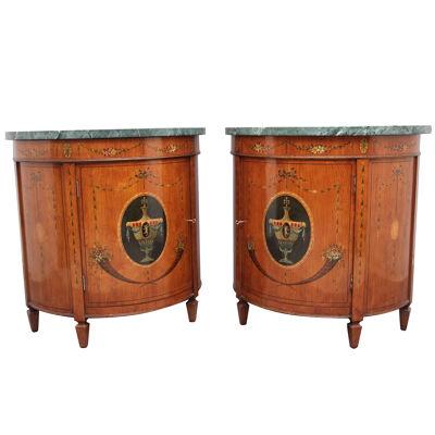 Pair of early 20th Century satinwood and painted demi lune cabinets 