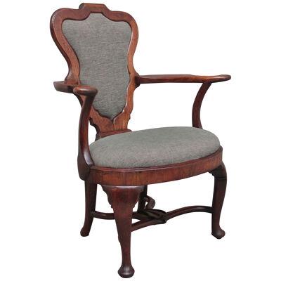 A fabulous quality and very rare George II walnut armchair