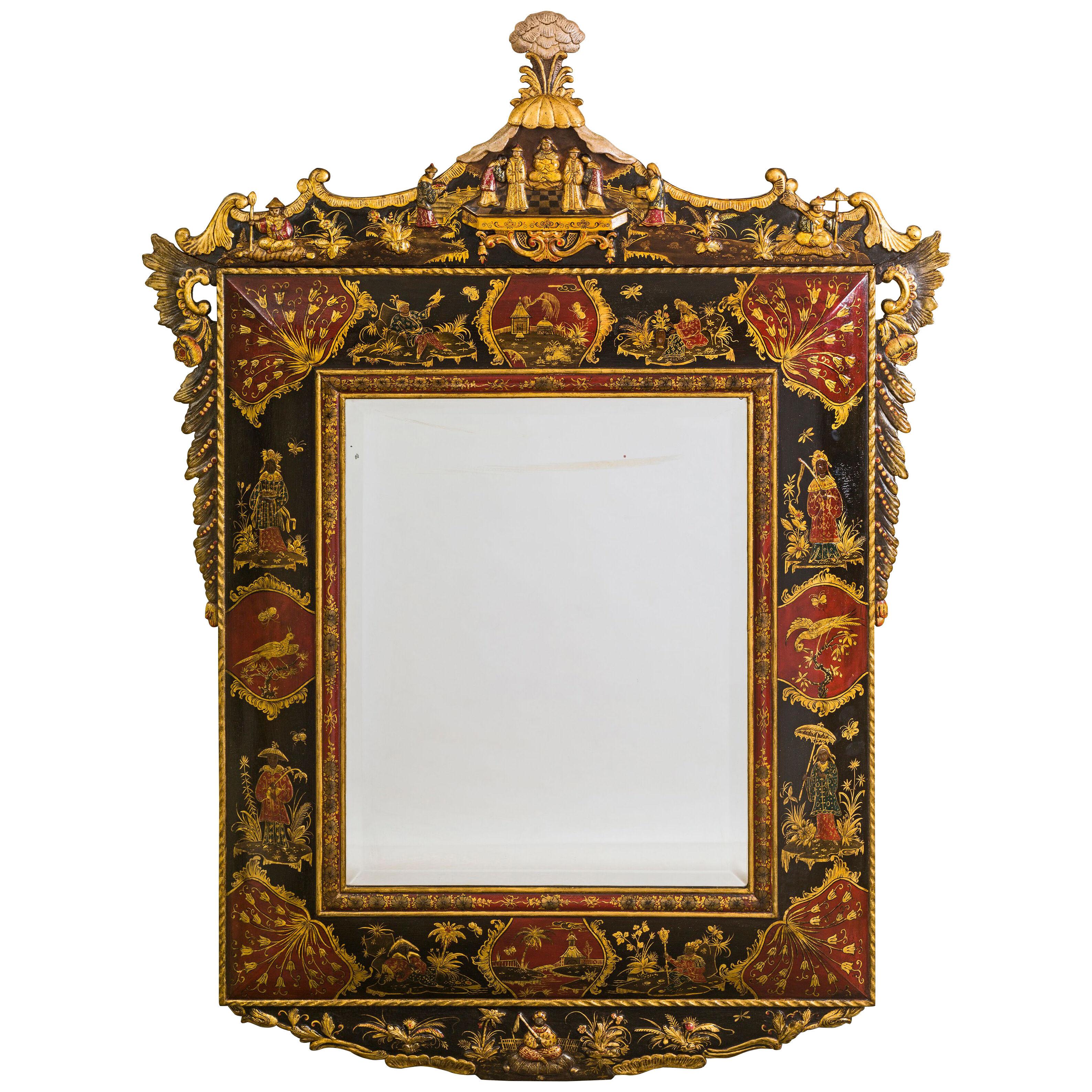 A German Red, Gilt and Black-Japanned Mirror In the Manner of Gerhard Dagly
