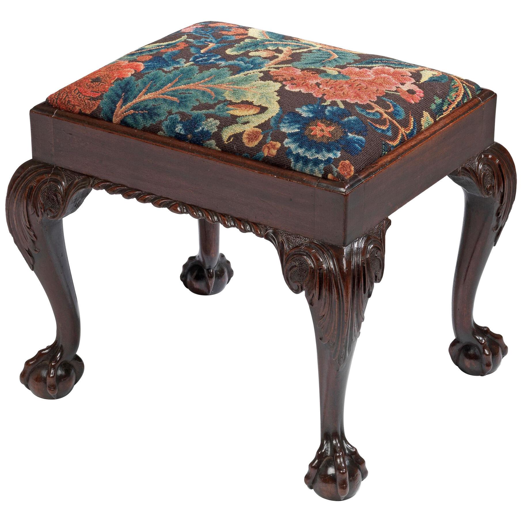 A George II Mahogany Stool upholstered with associated 18th Needlework