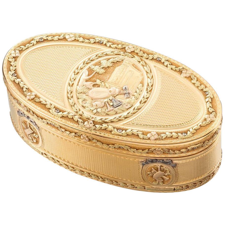 A French Vari-Colour Oval Gold Box
