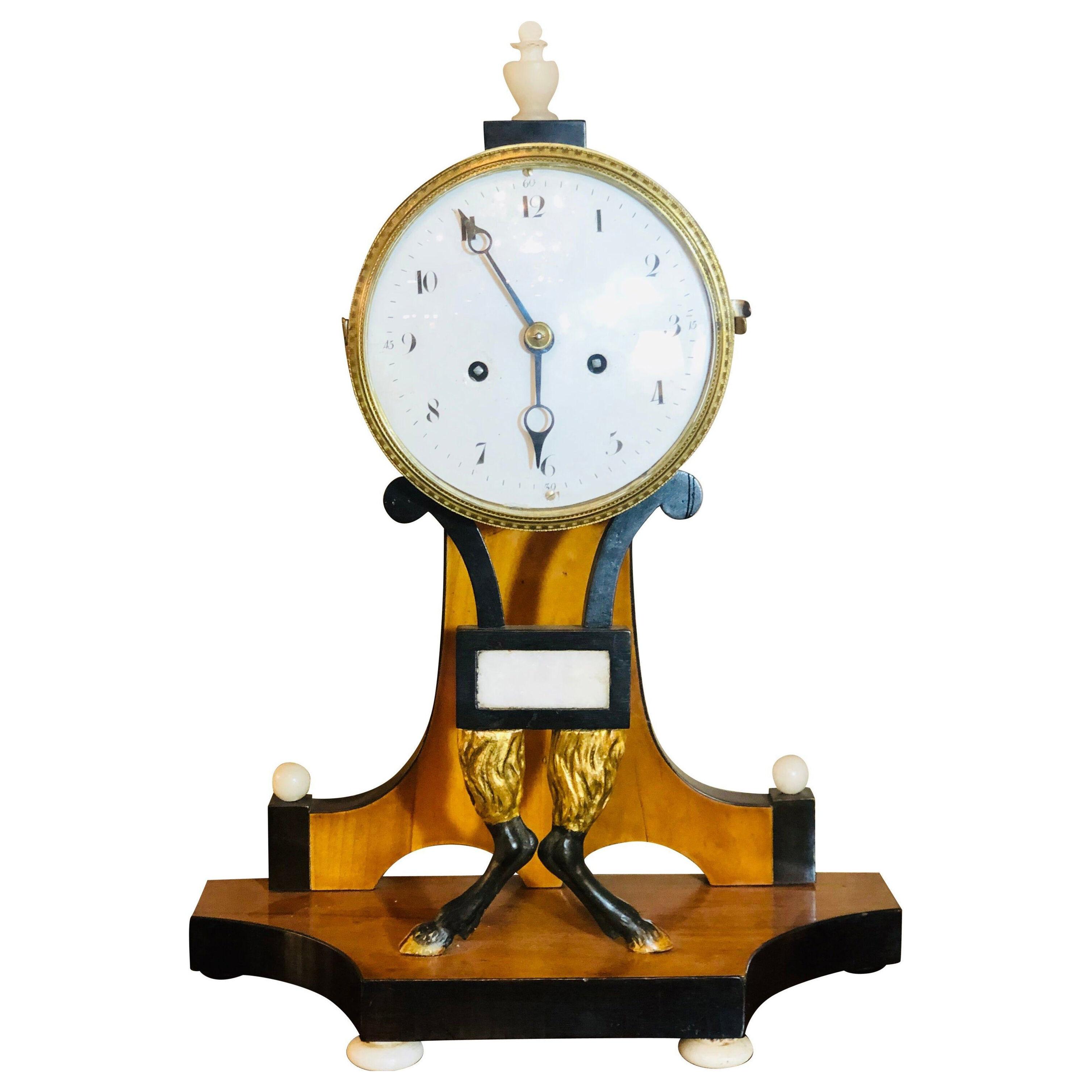 Biedermeier Mantle Clock with Ebonized Details and Hoof Legs Silk Suspension