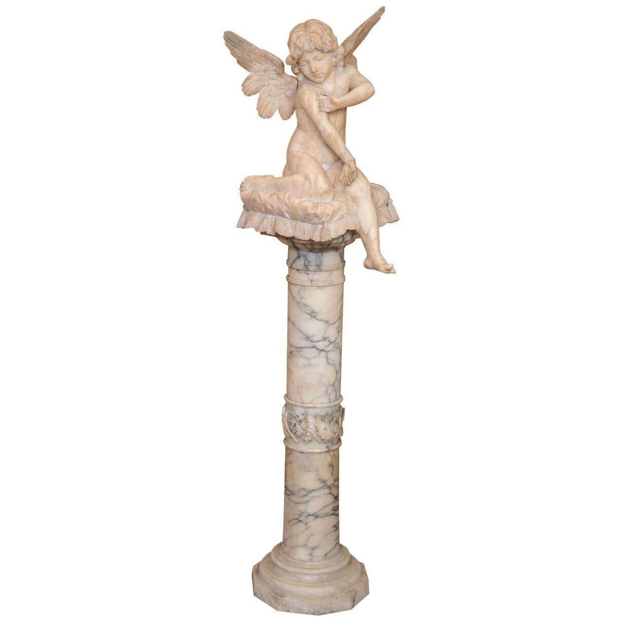 Alabaster Figure Winged Angel Sitting On A Pillow on an Alabaster Pedestal