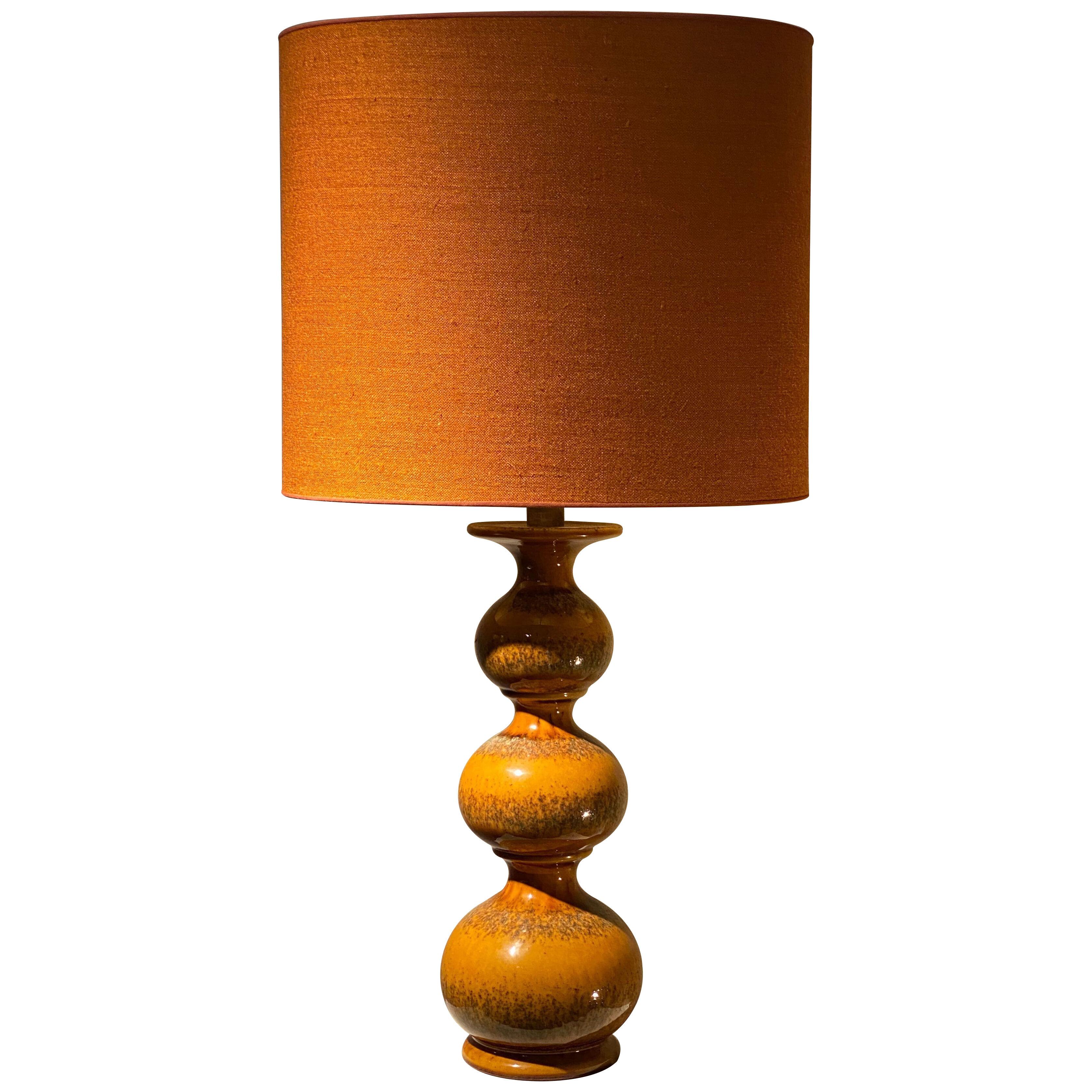 Ceramic Table Lamp Kaiser in an Orange color With New Oval Shade