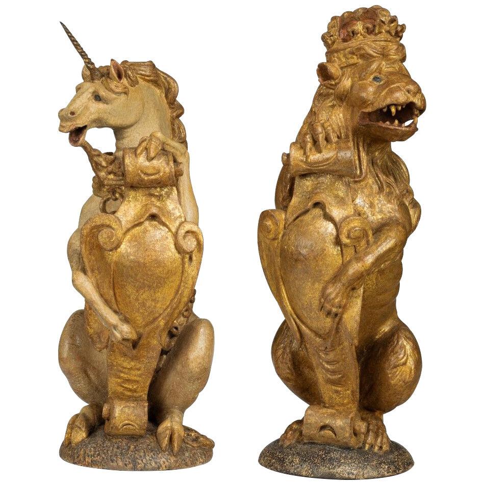 Carved Oak Polychrome and Parcel-gilt Heraldic Supporters - a Lion and a Unicorn