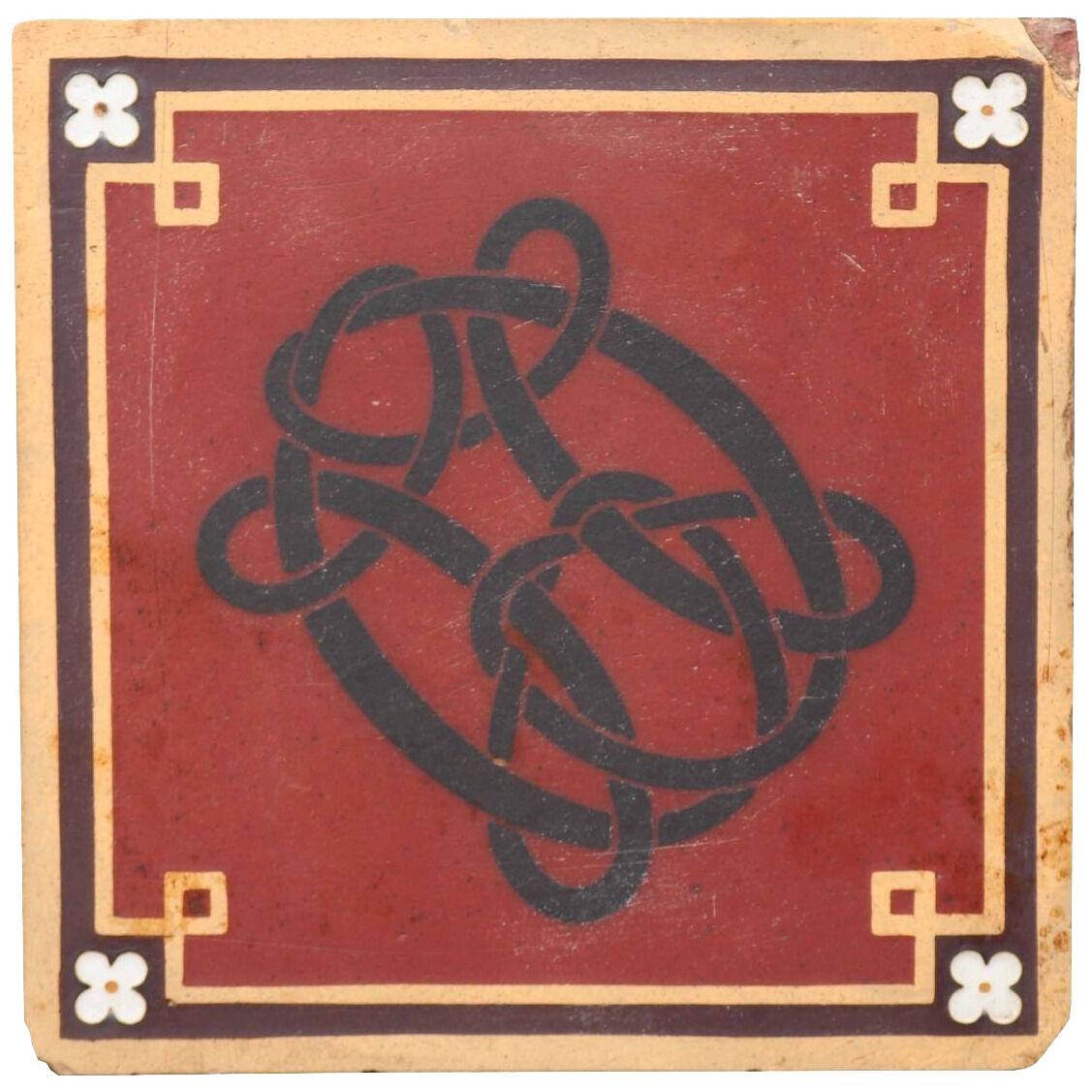 An Antique Monogrammed Minton Encaustic Tile