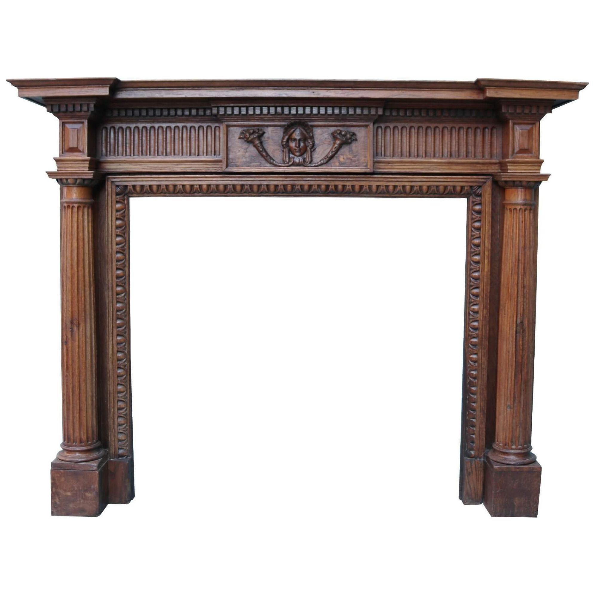 Late 19th Century Georgian Style Carved Oak Fireplace