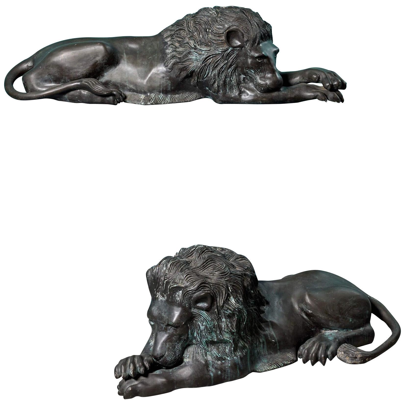 A Pair of Bronze Lions in The Manner of Antonio Canova