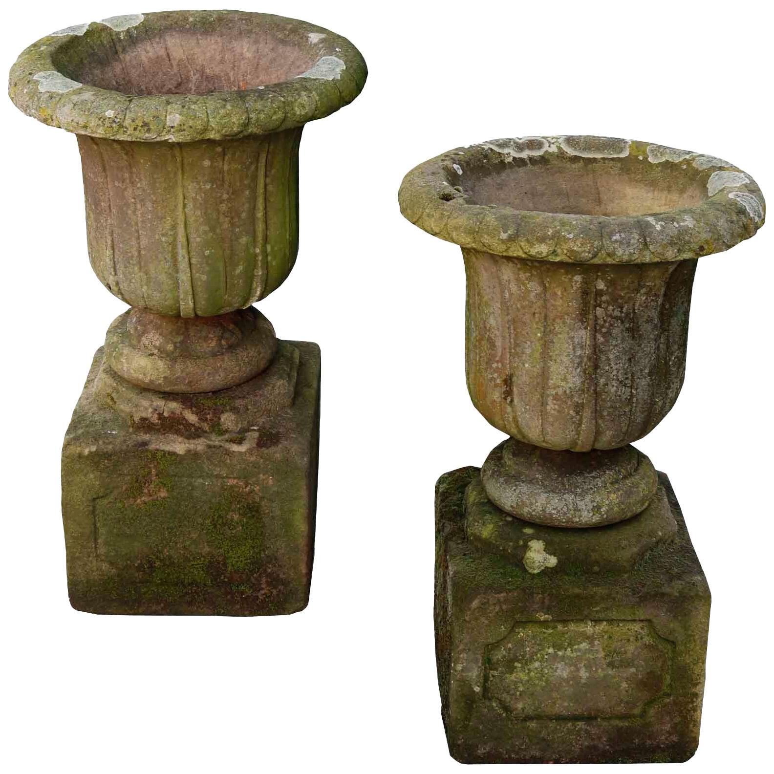 Pair of English Carved Sandstone Urns