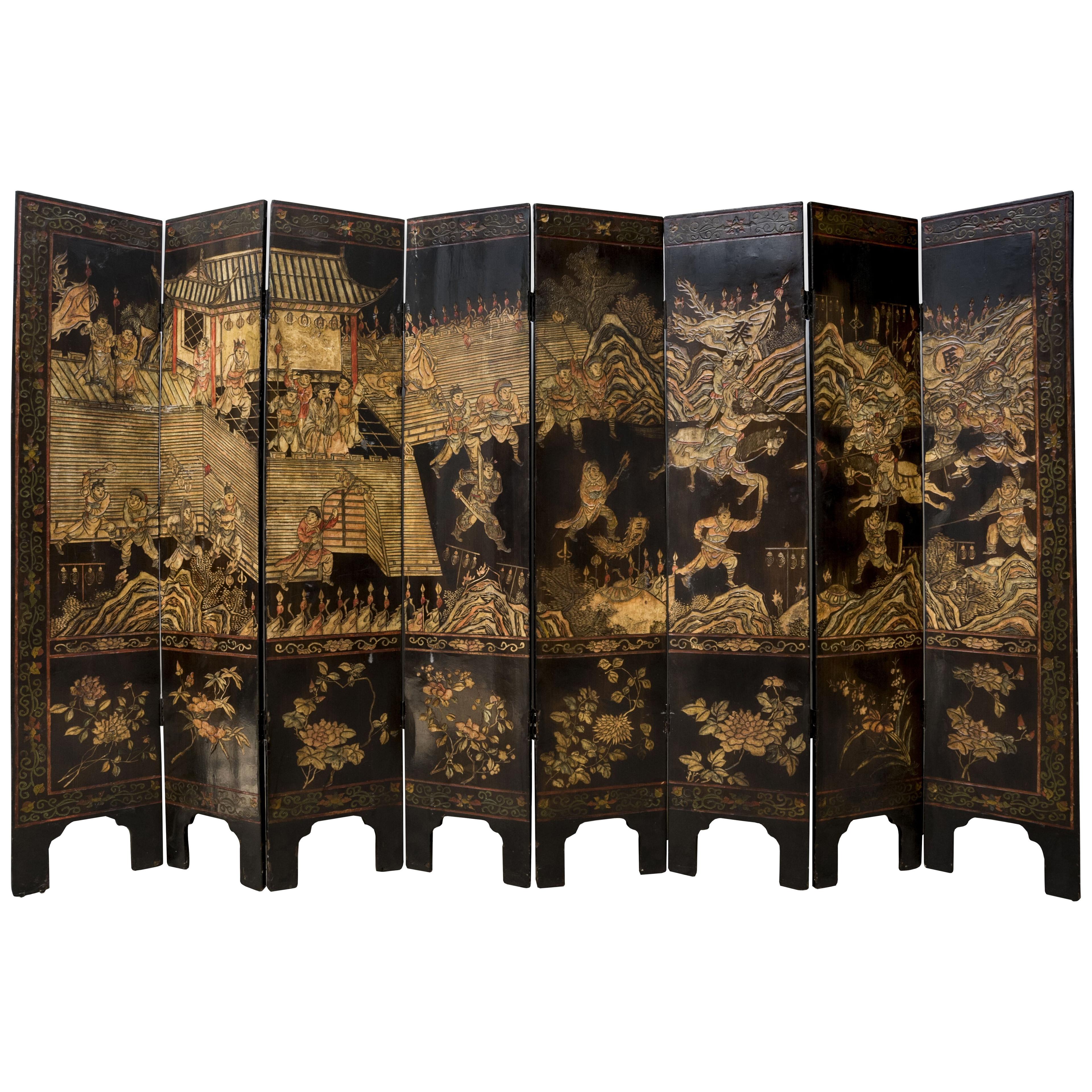 Chinese eight-panels Coromandel screen with battle scene, birds and foliage