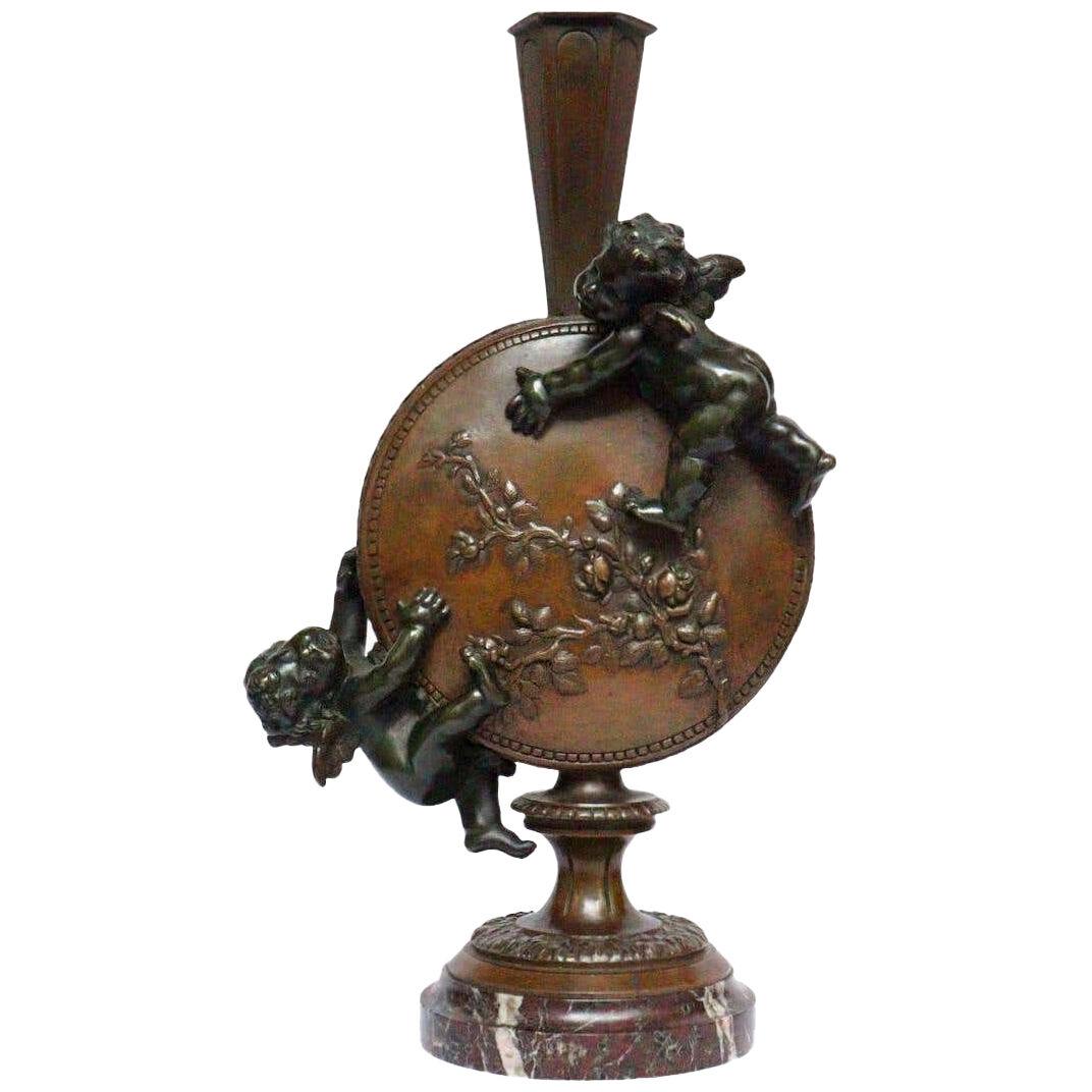 A French Napoléon III Bronze Putti Vase by Auguste Moreau (1834-1917)