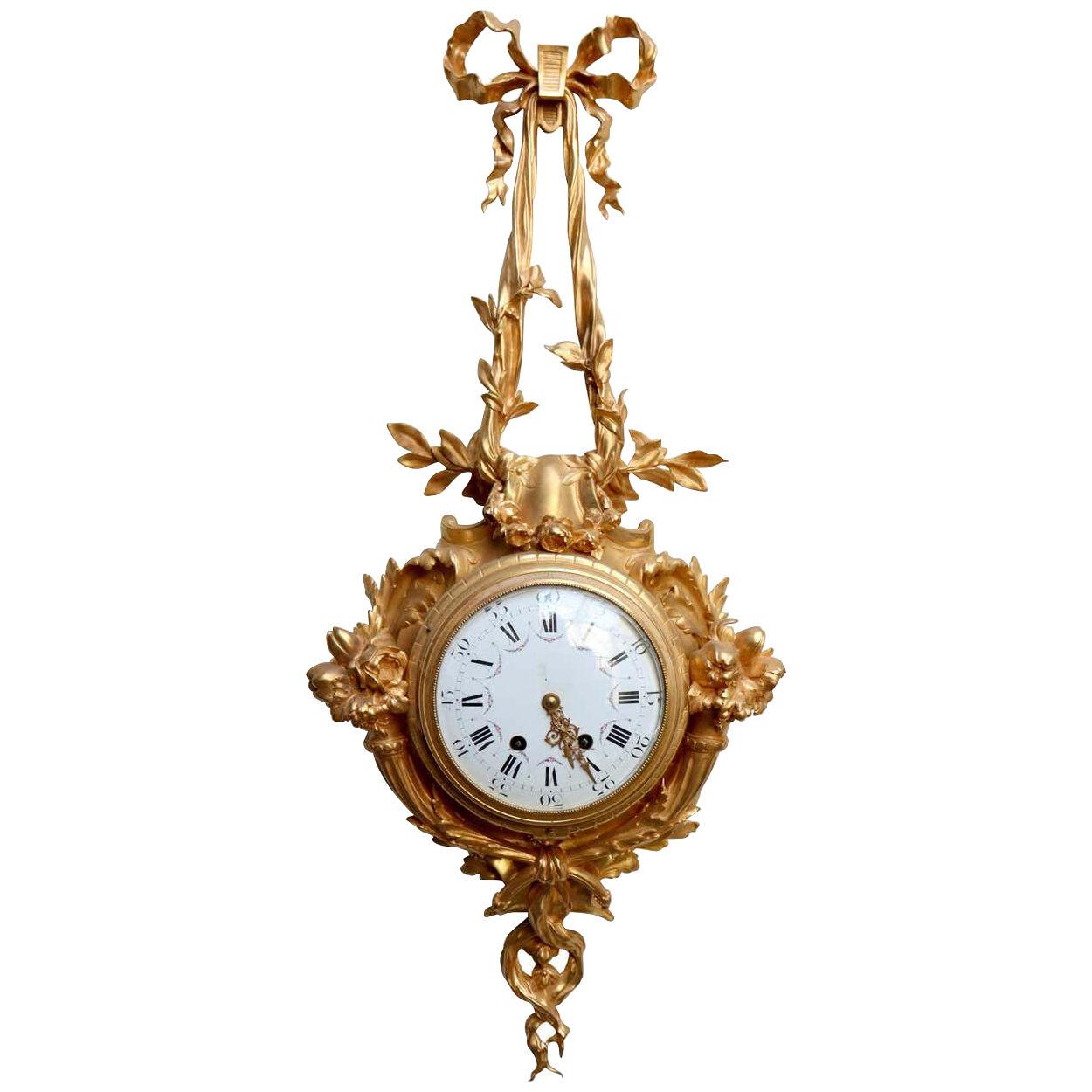 A French Napoléon III Ormolu Cartel Clock, after Caffieri, circa 1880