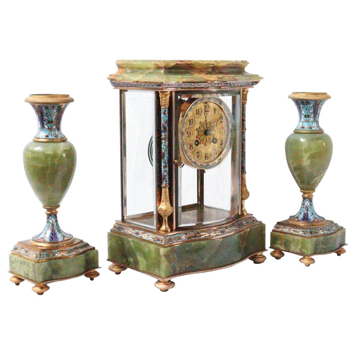 A 19th Ccentury French Ormolu and Champlevé Enamel Three-Pieces Clock Garniture