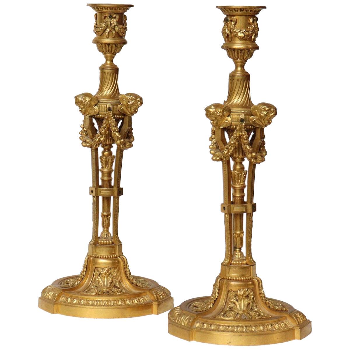 A Pair of French 19th Century Louis XVI Style Ormolu Candlesticks