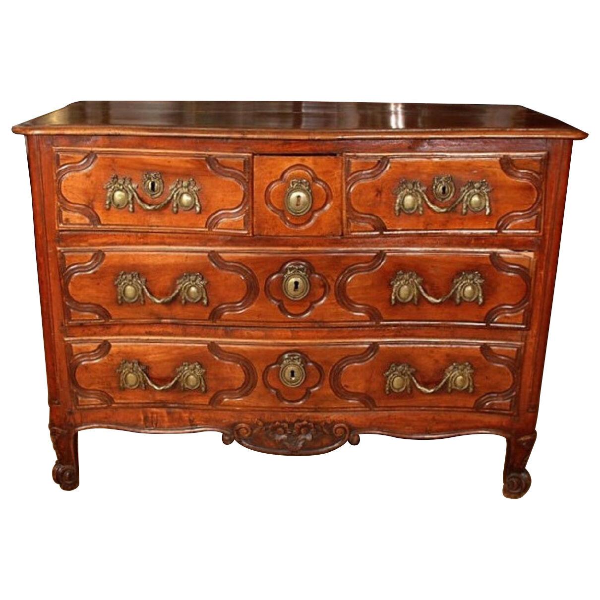 A Louis XV Commode by Hubert Roux