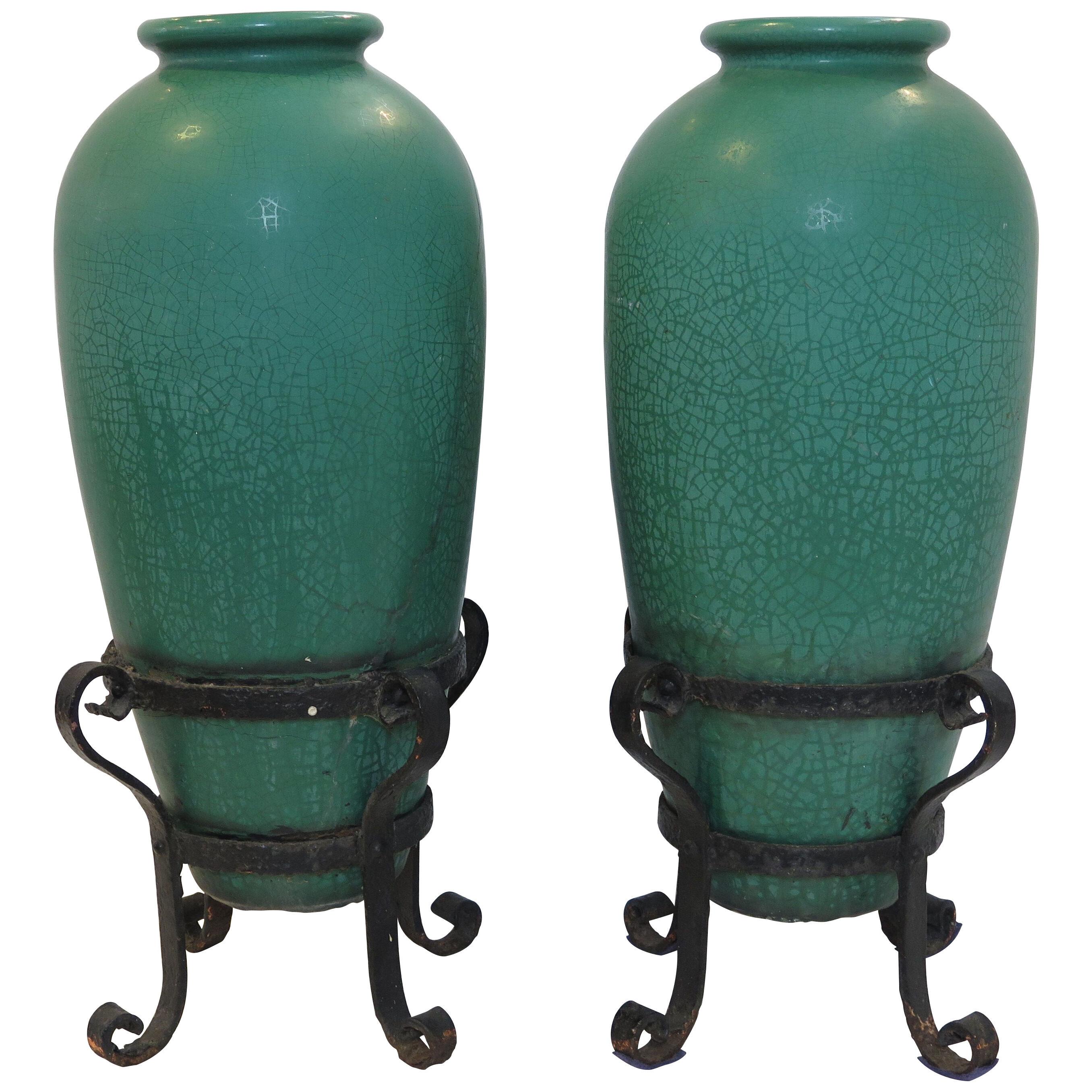 A Pair of Galloway Pottery Crackled Glaze Urns with Iron Stands