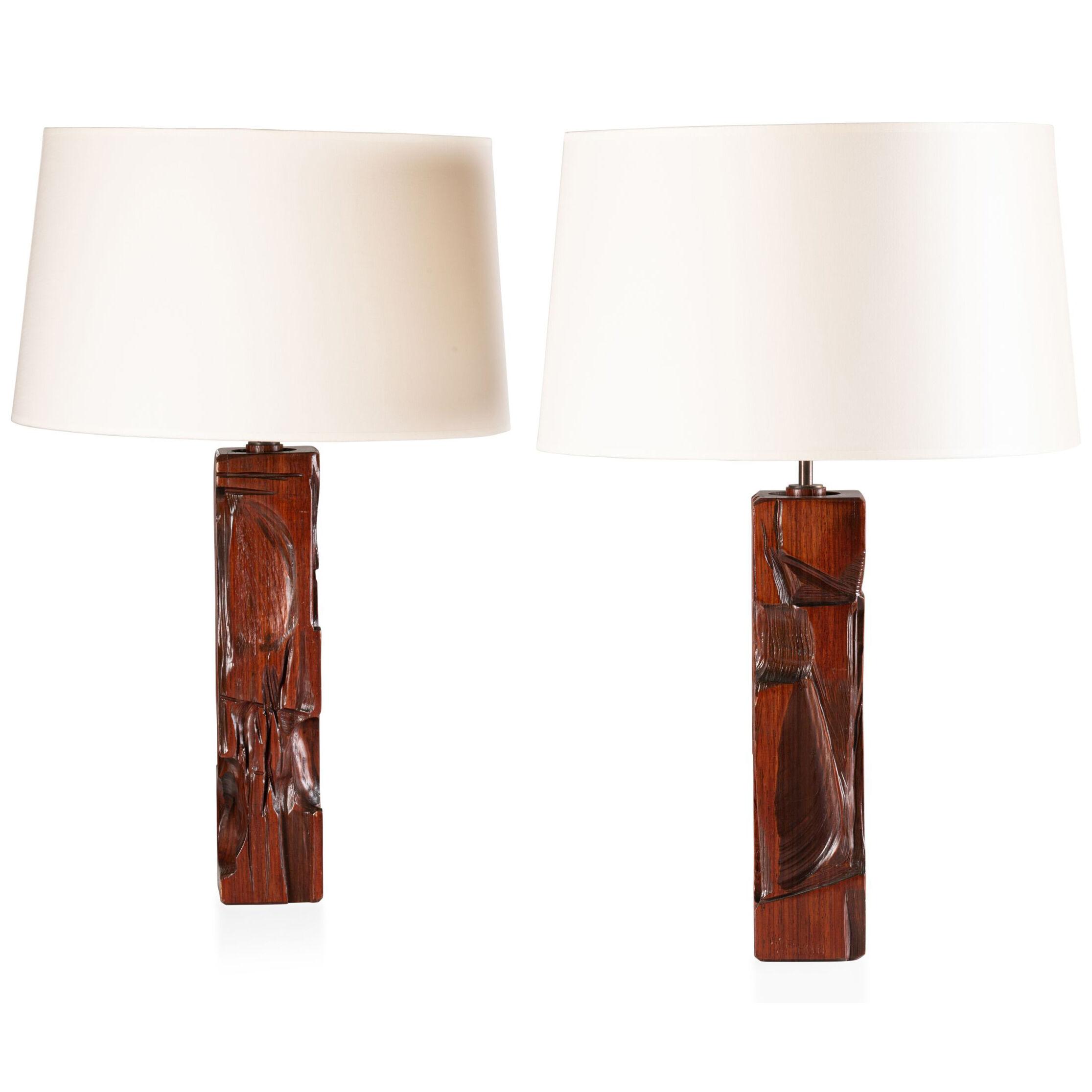 Pair of  carved wood table lamps by Gianni Pinna
