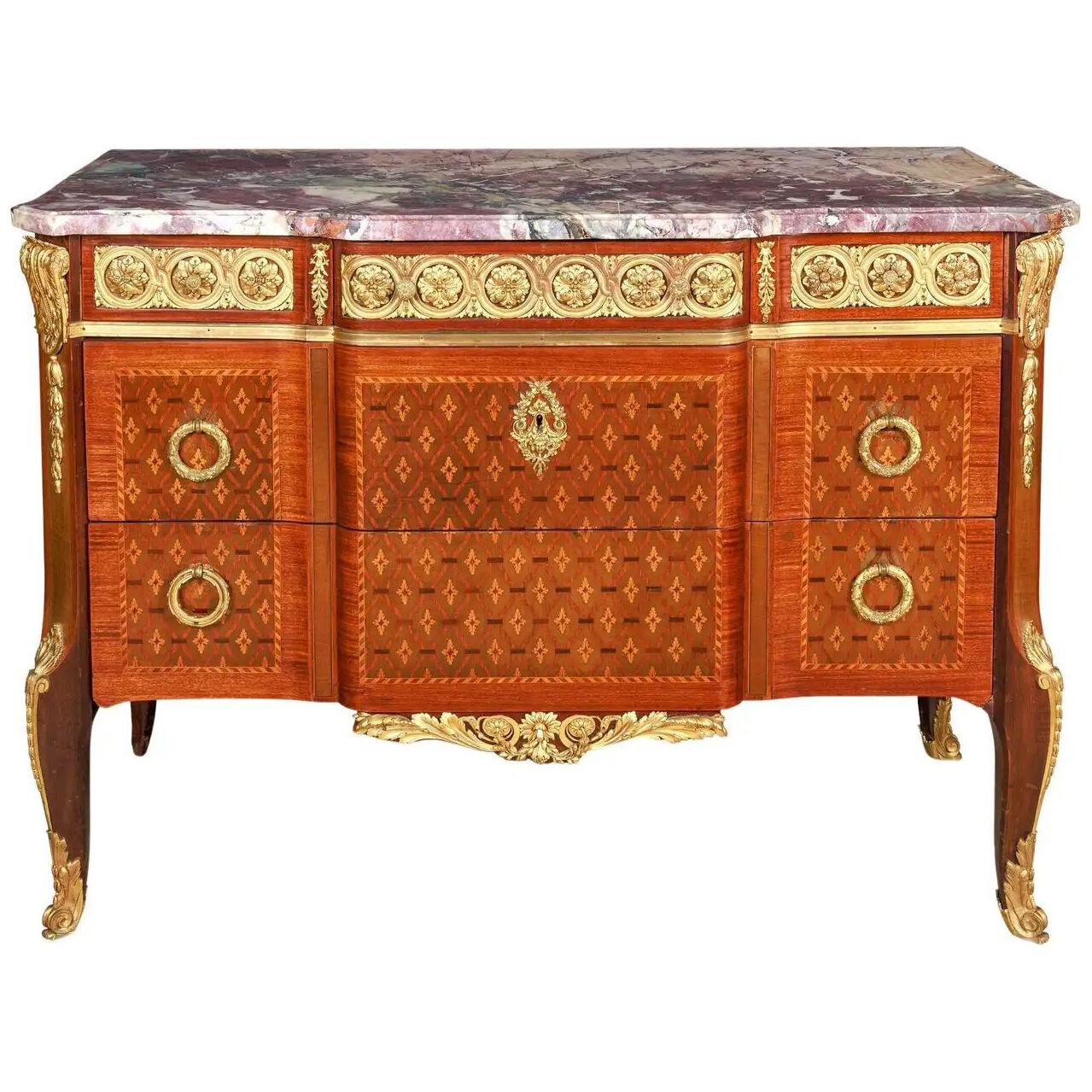 A French Louis XVI Style Ormolu-Mounted Marquetry and Parquetry Commode