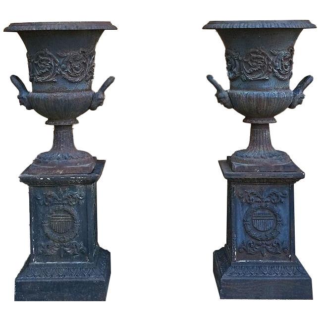 Complete Pair of 19th Century Cast Iron Urns on Plinths