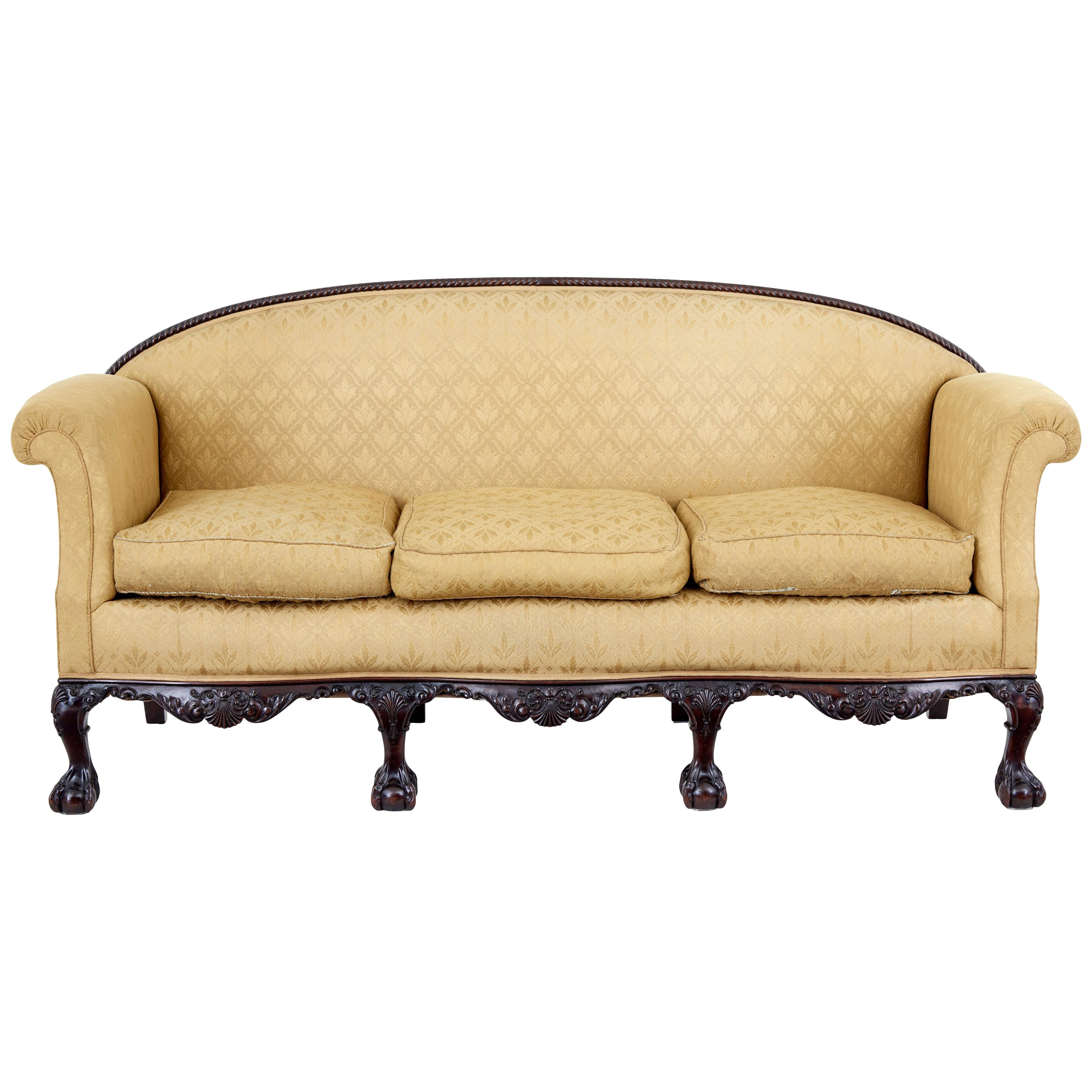 EARLY 20TH CENTURY CHIPPENDALE REVIVAL CARVED MAHOGANY SOFA