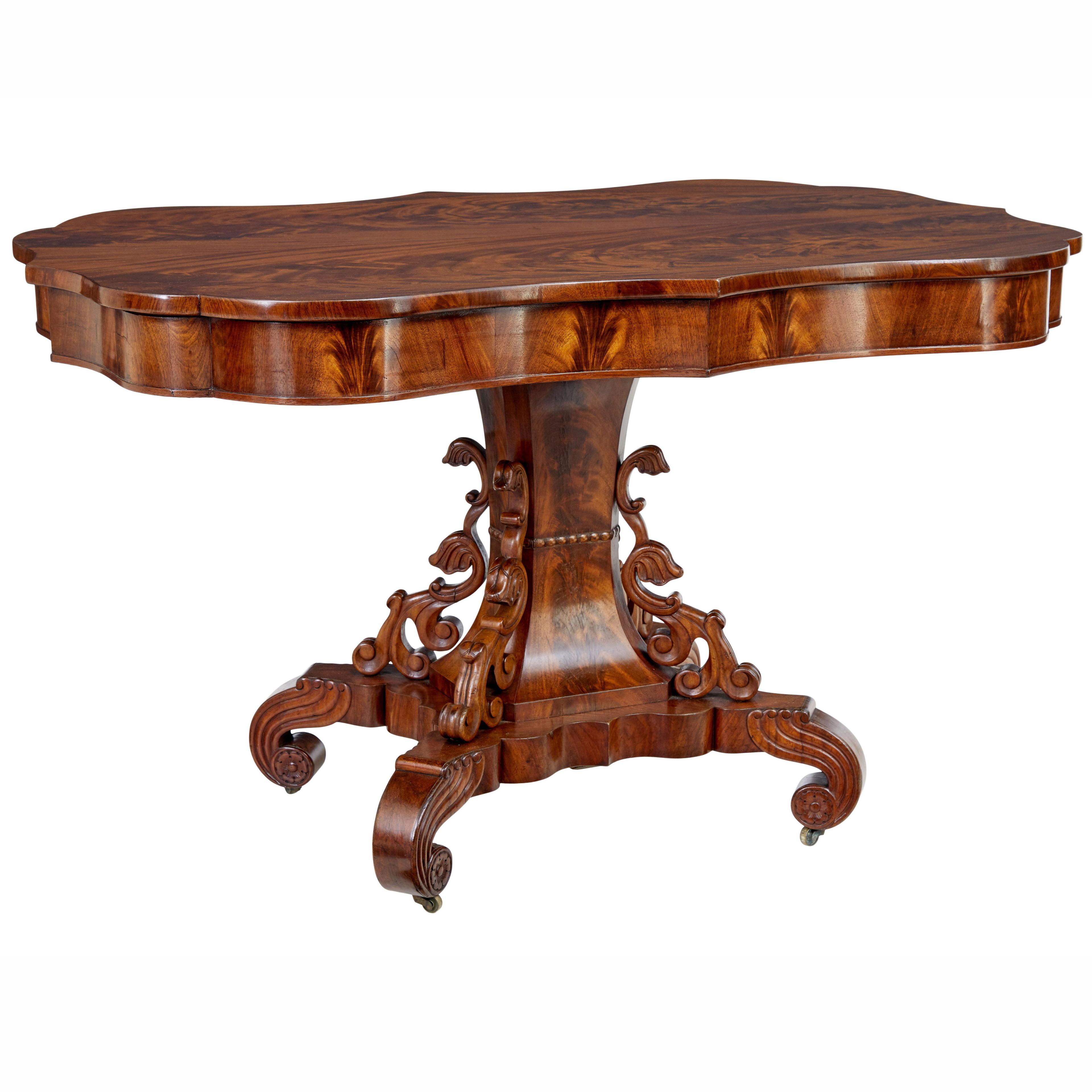 19TH CENTURY DANISH CARVED FLAME MAHOGANY CENTER TABLE