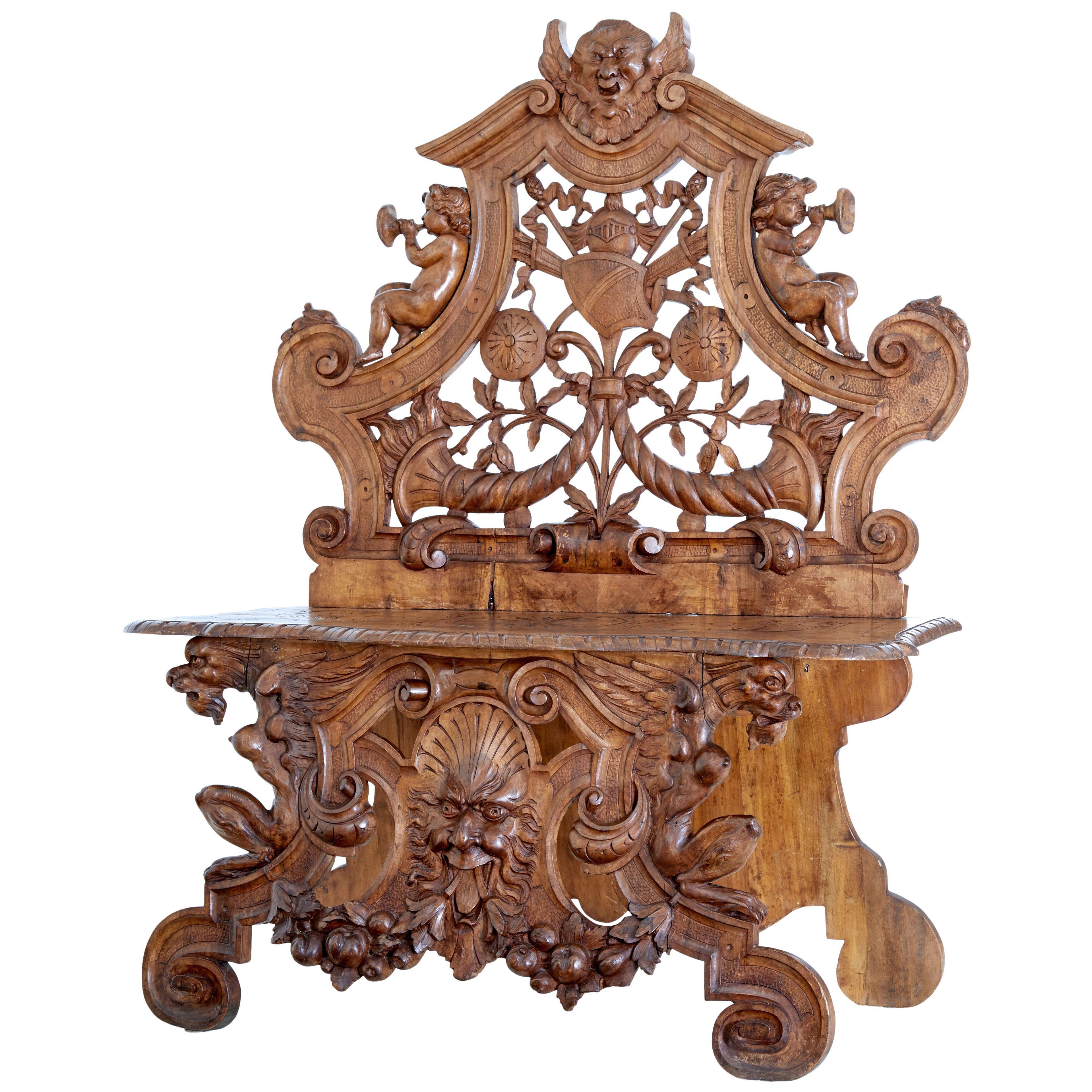19TH CENTURY HEAVILY CARVED FLEMISH WALNUT DECORATIVE CHAIR