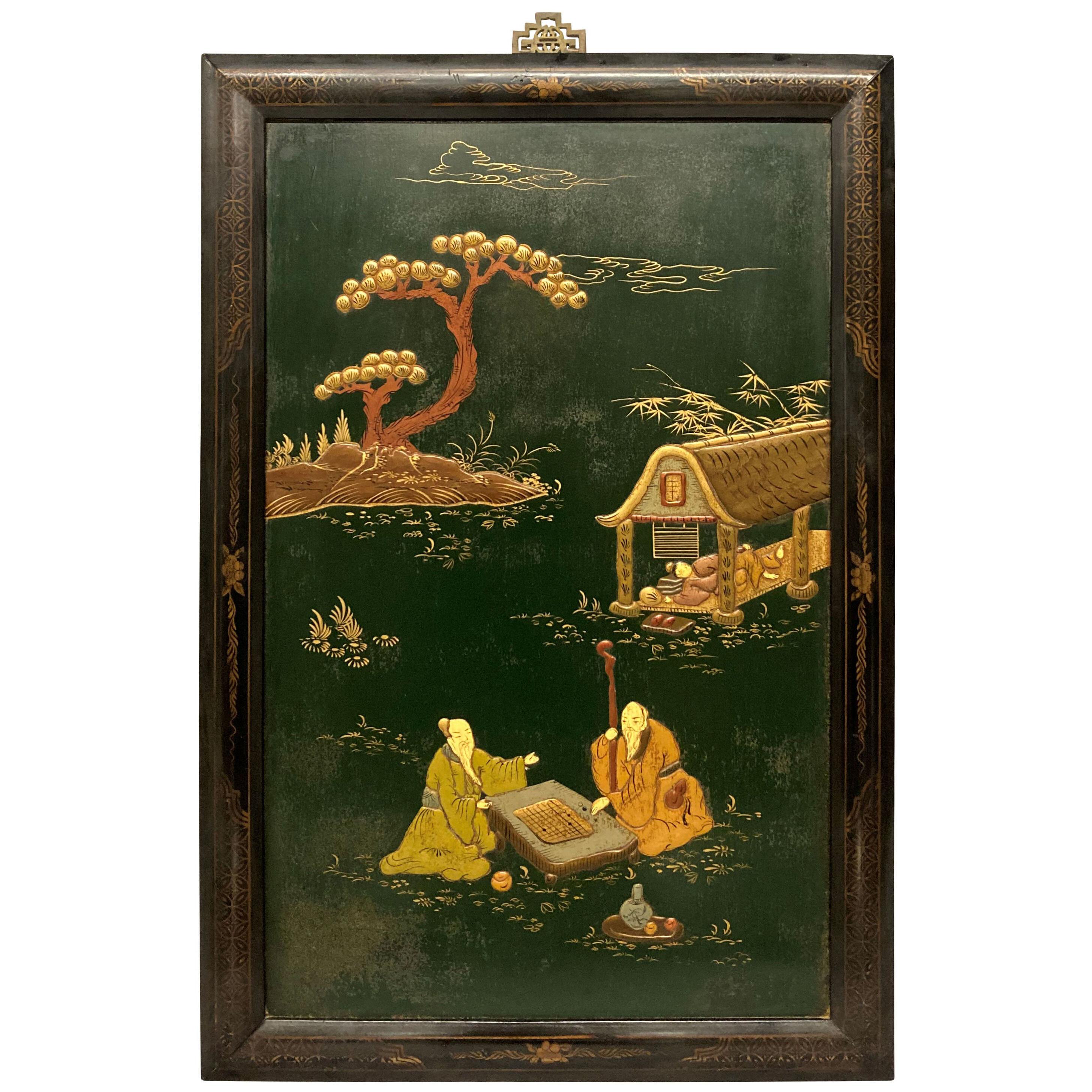 A FRAMED GREEN LACQUERED CHINESE PANEL