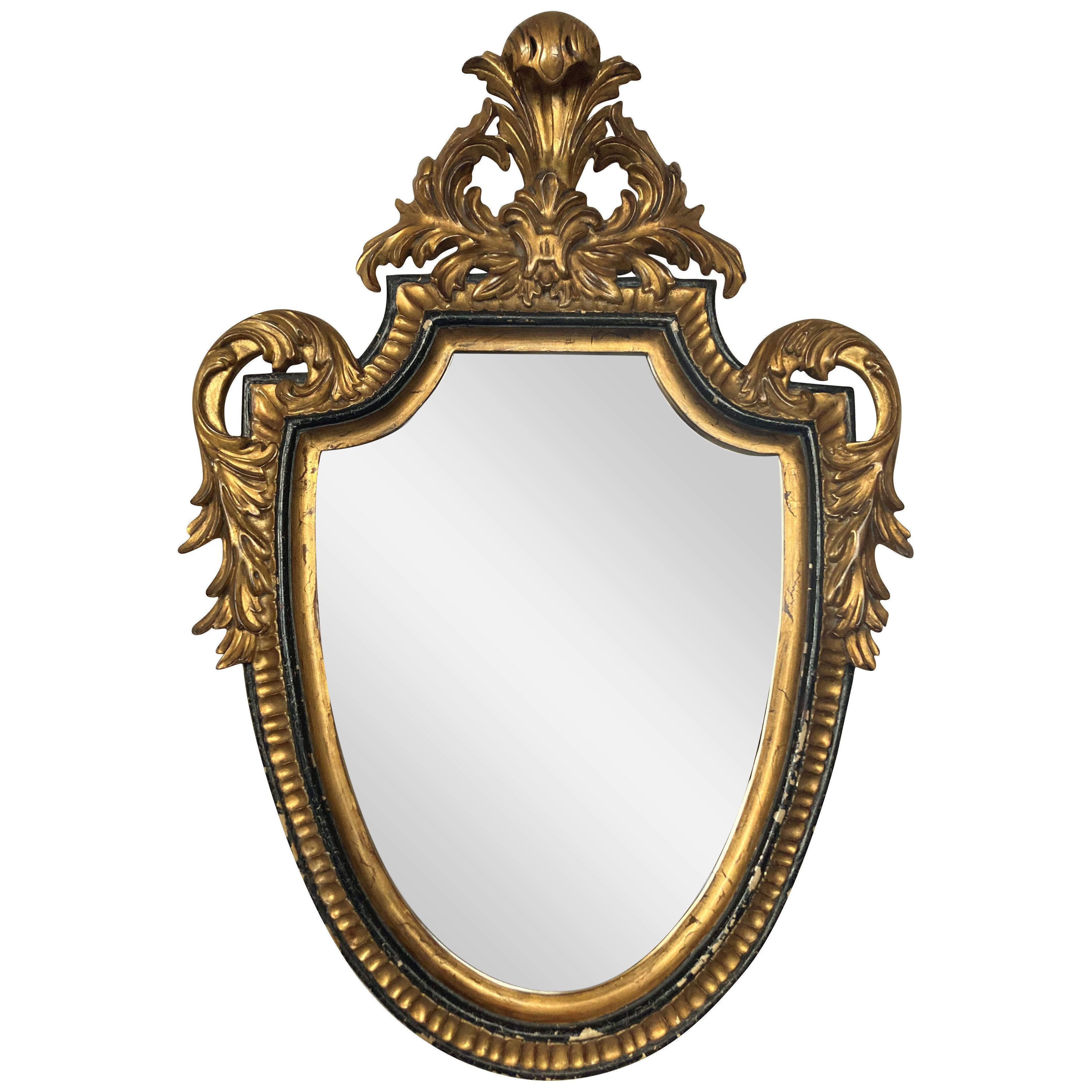 A LOUIS XV STYLE GILT WOOD MIRROR BY DAUPHINE