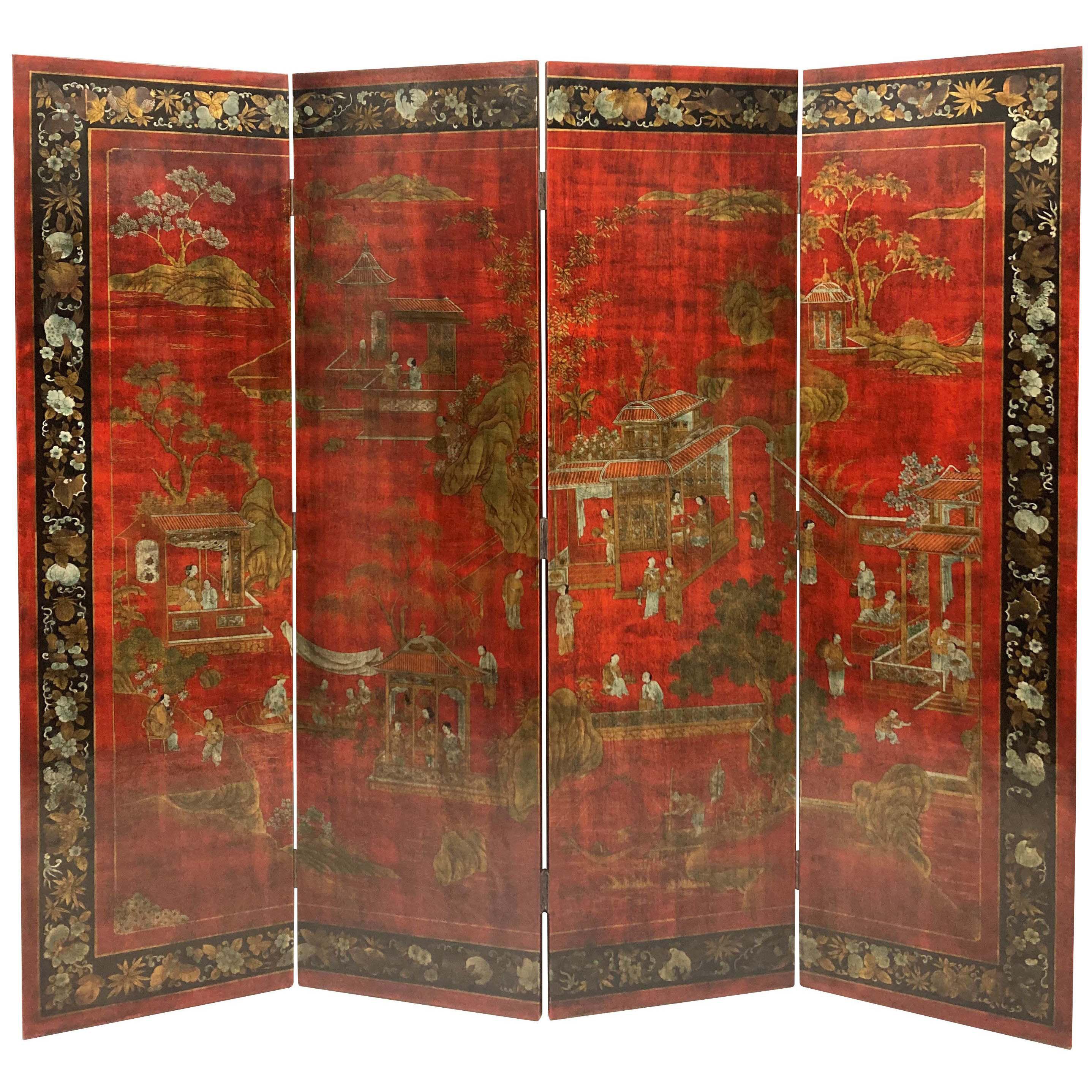 A CHINESE RED LACQUERED FOUR FOLD DECORATIVE SCREEN