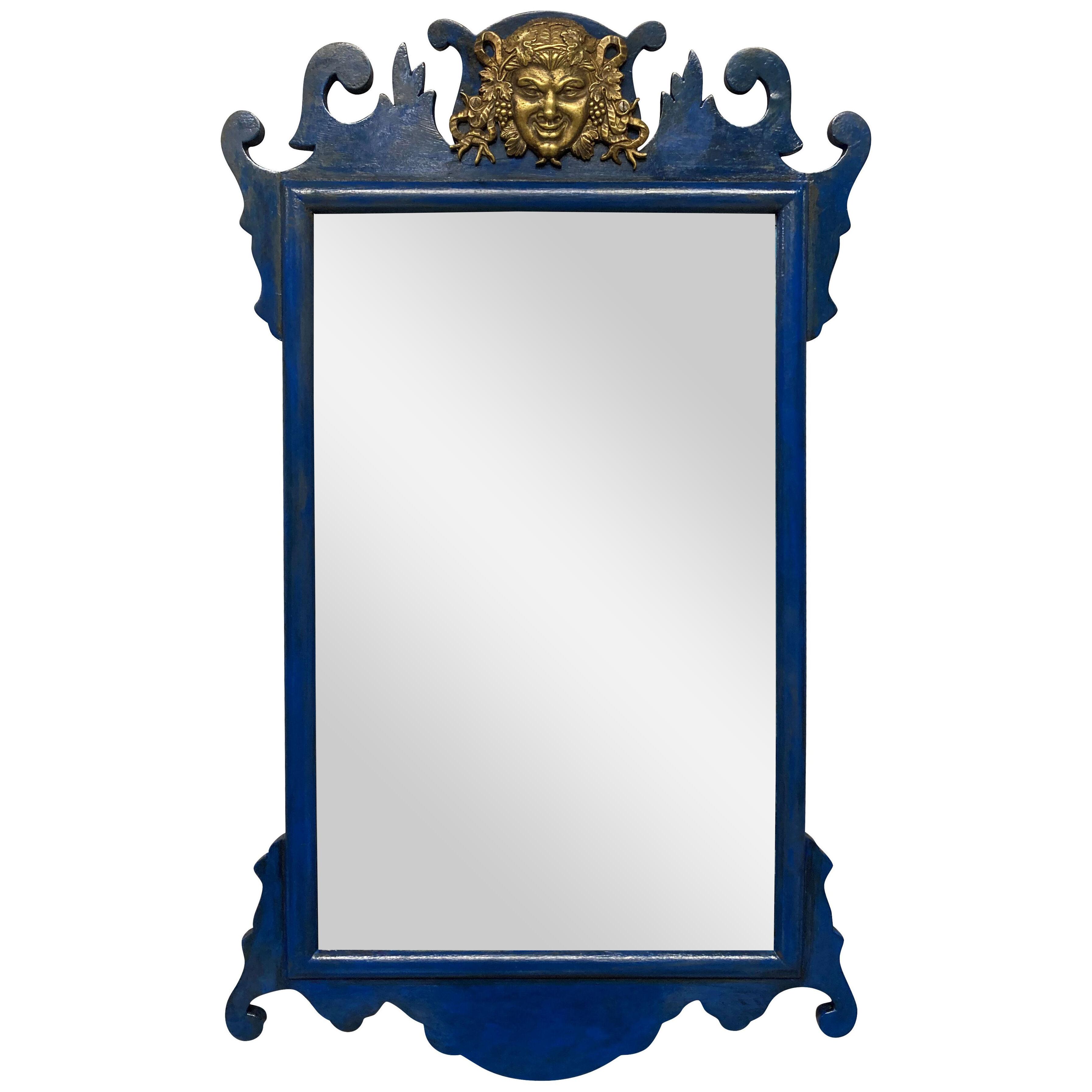 A CHARMING BLUE LACQUERED TOILET MIRROR FEATURING DIONYSUS