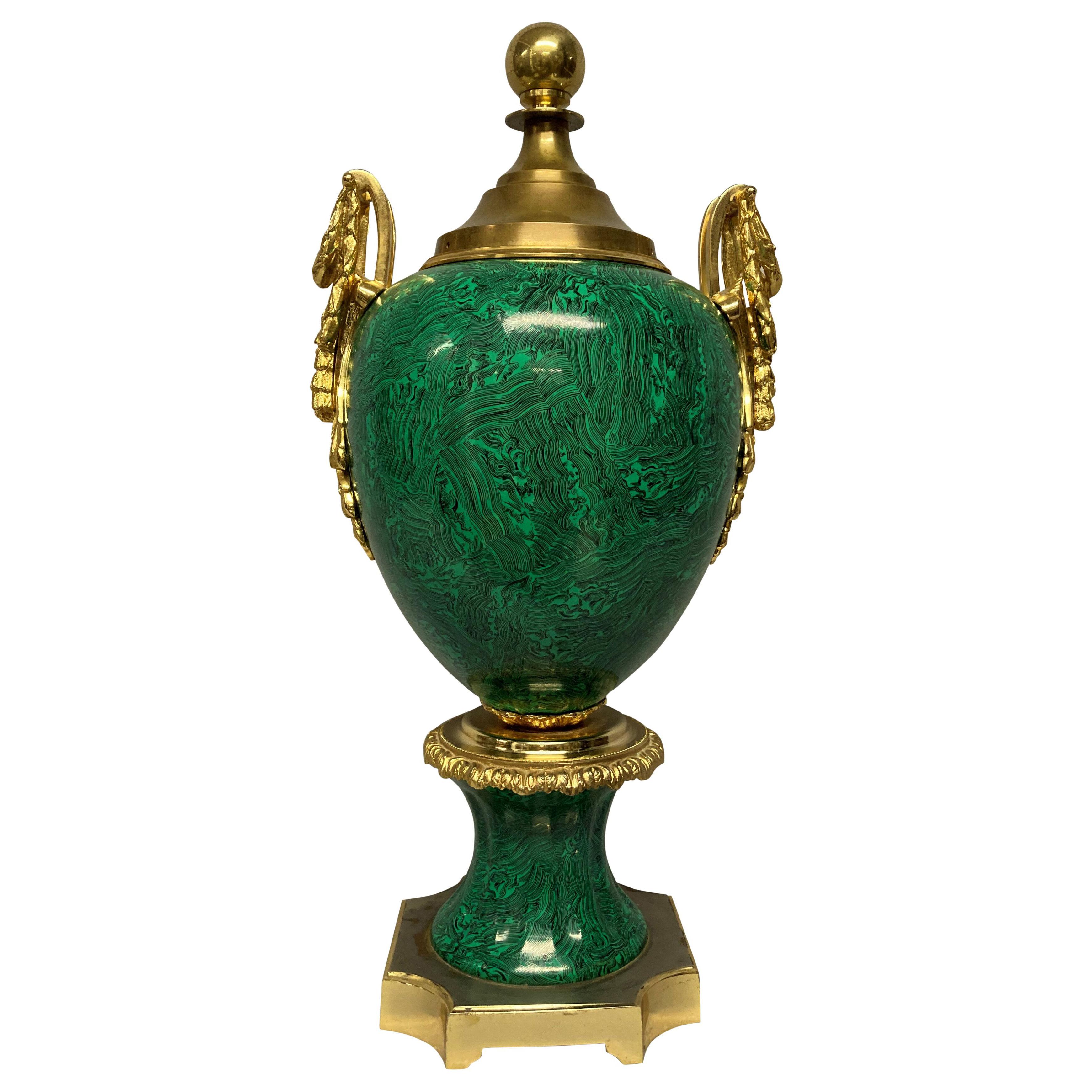 A LARGE MID-CENTURY TWIN HANDLED PORCELAIN URN IN FAUX MALACHITE