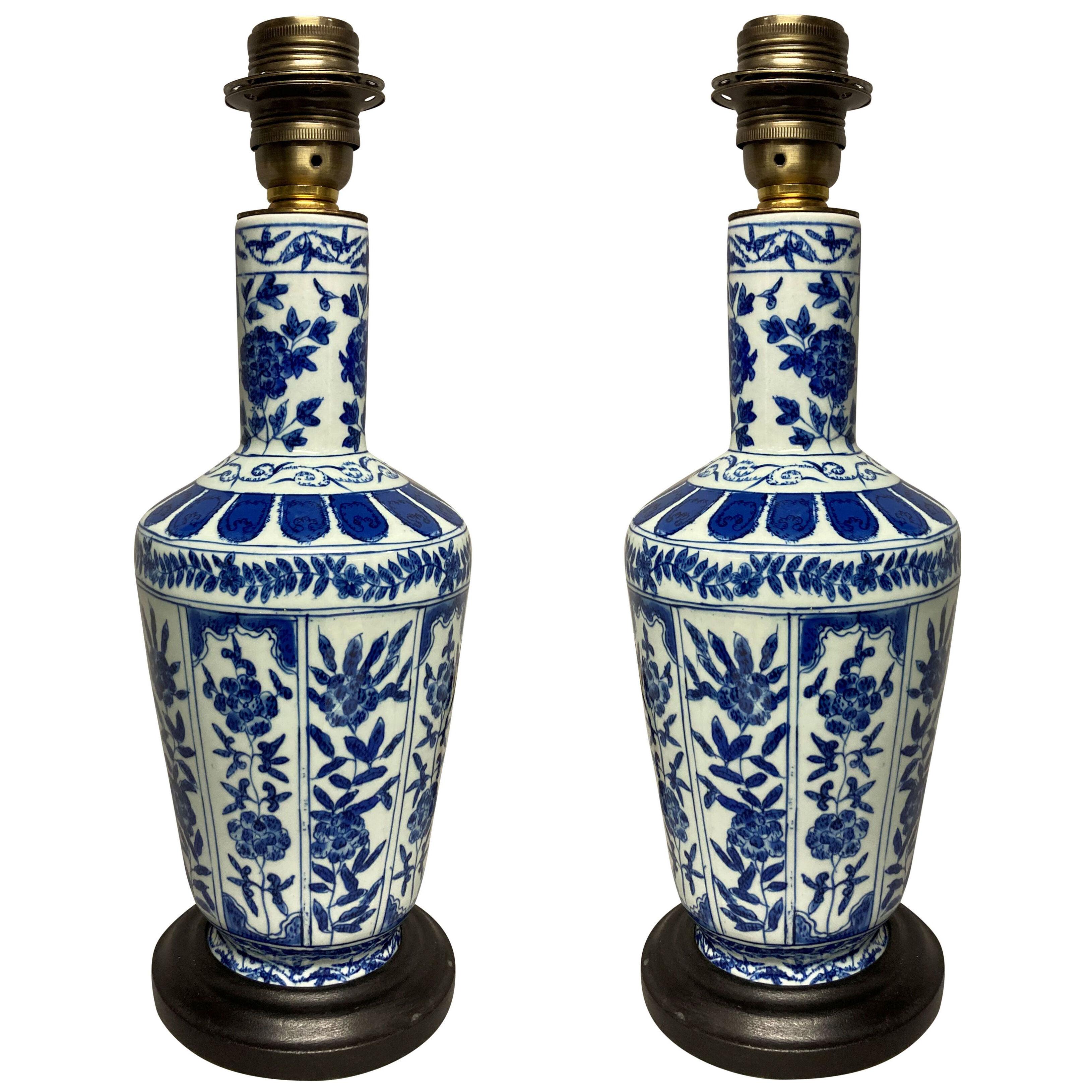 A PAIR OF BLUE & WHITE PERSIAN LAMPS